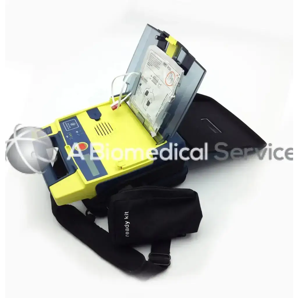 Yellow and blue cardiac science aed power heart g3 with black ready kit carrying case for emergency use