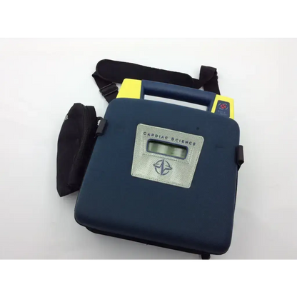 Blue and yellow cardiac science aed trainer case with silver logo plate designed for portable cardiac science aed use