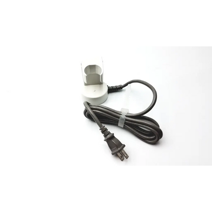 White plastic cardinal health 4414 surgical clipper charging adapter with coiled black power cord for rechargeable nimh battery