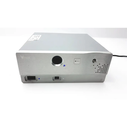 Silver carefusion vmax encore projector with matte finish circular lens and side ventilation holes for analyzer assembly