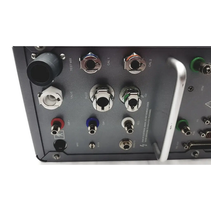 Black electronic test equipment panel with colored connectors and silver handle on back of carefusion vmax encore 229 analyzer