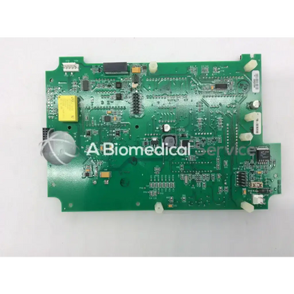 Green printed circuit board with electronic components and yellow capacitor for casmed 03090235r00 board