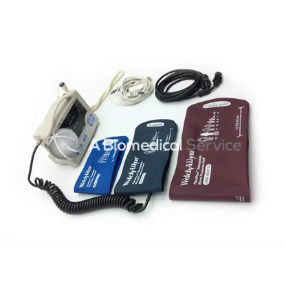 Weldyallyn blood pressure monitor kit with beige digital cuff unit, blue and black inflatable cuffs, and maroon reusable vital signs cuff