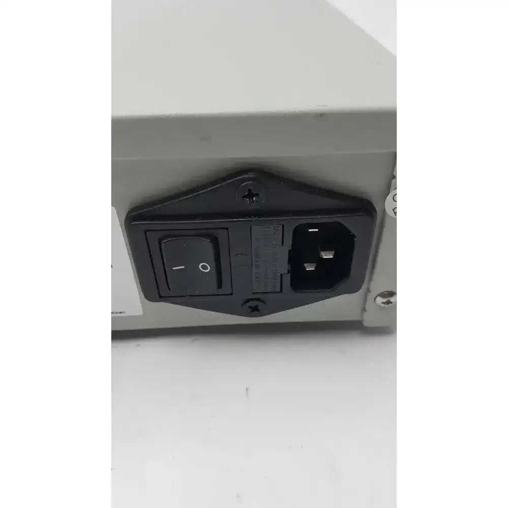 Black plastic power switch and plug assembly on the back of a cbs scientific eps-300 iiv electrophoresis power supply