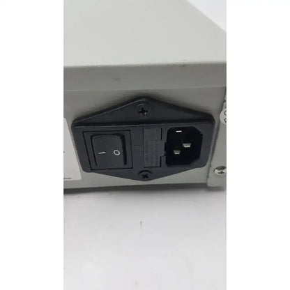 Black plastic power switch and plug assembly on the back of a cbs scientific eps-300 iiv electrophoresis power supply