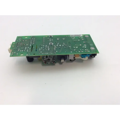 Green rectangular circuit board with silver solder points and components in celestica m3046-60002 power supply