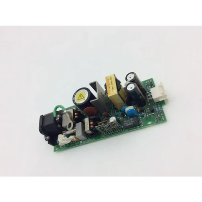 Green printed circuit board with black yellow and blue capacitors mounted on celestica m3046-60002 power supply