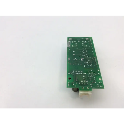 Green rectangular celestica m3046-60002 power supply circuit board with silver solder points and white connector at bottom