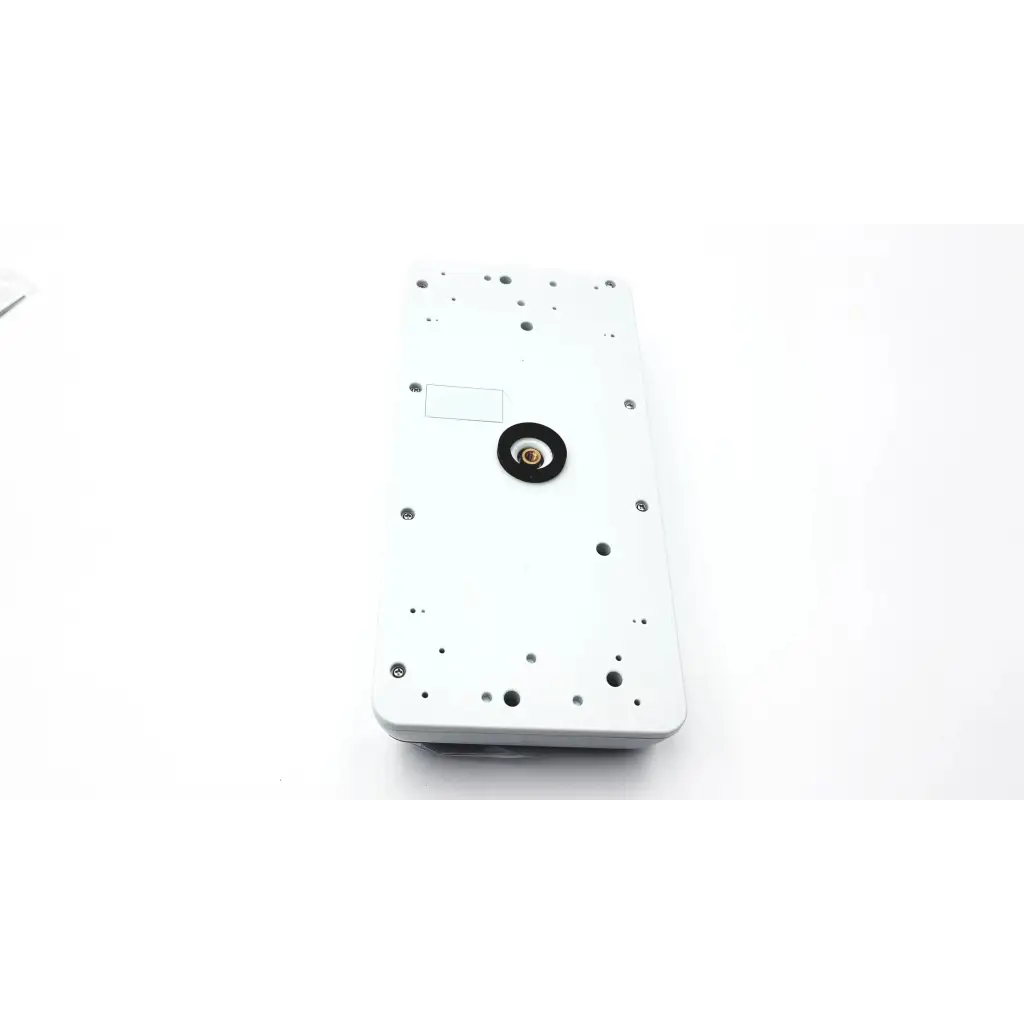 White rectangular CenTrak monitor itdk-325 with central black circular component and multiple small holes around perimeter