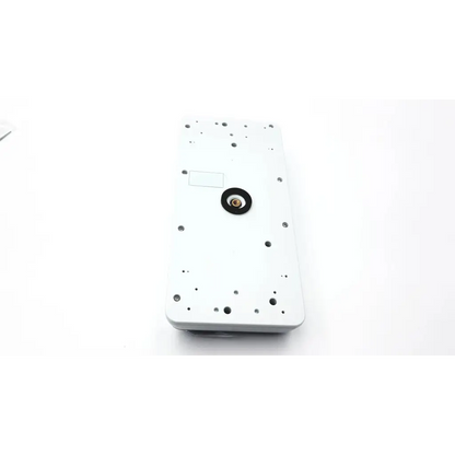 White rectangular CenTrak monitor itdk-325 with central black circular component and multiple small holes around perimeter