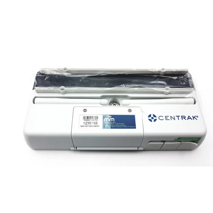 White plastic centrak mm vw monitor itdk-325 g device with black component wrapped in clear film on top ab3-7 2923sm