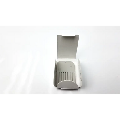 A sleek light gray plastic dental impression tray with hinged lid and ridges for precise molds in cerustop wax guards