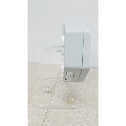 White rectangular chemdaq steri-trac 2 fixed gas monitor with sleek plastic casing and visible mounting hardware