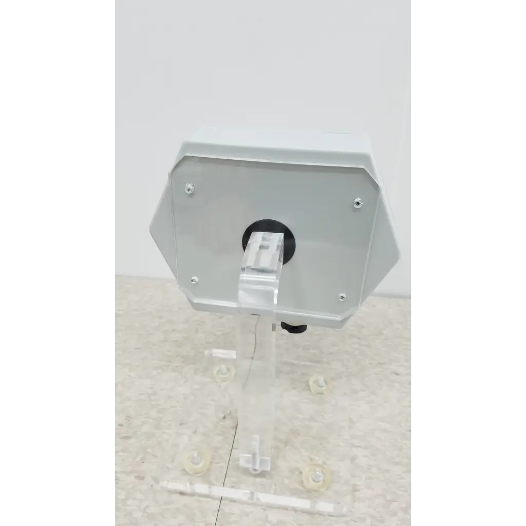 Chemdaq steri-trac 2 fixed gas monitor system with gray octagonal industrial outdoor speaker and clear acrylic bracket