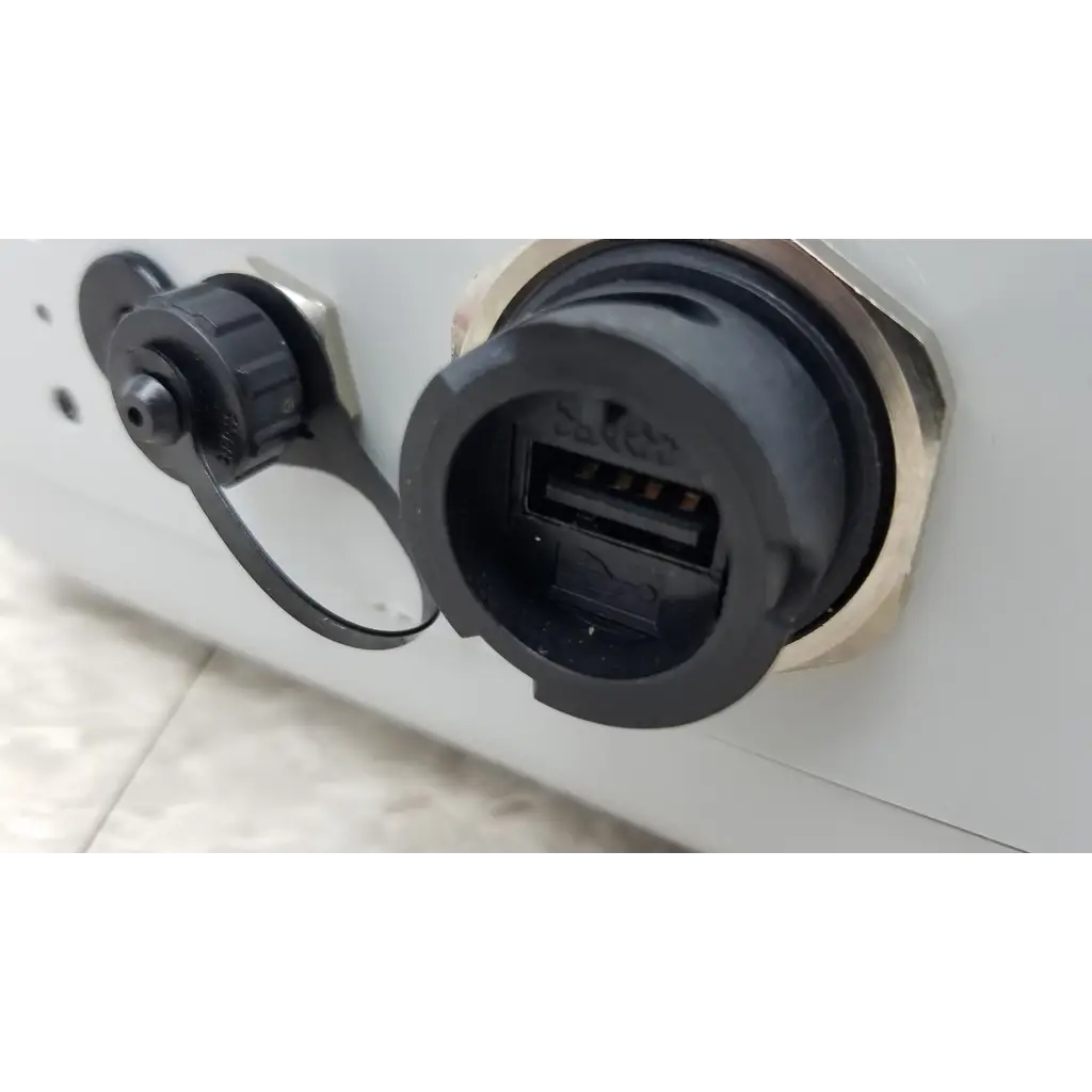 Black usb port with protective cap and locking mechanism on the back of chemdaq steri-trac 2 fixed gas monitor panel