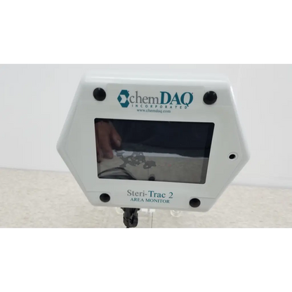 White hexagonal chemdaq steri-trac 2 peracetic acid monitor with digital display acrylic stand and black mounting screws