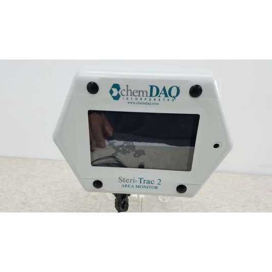 White hexagonal chemdaq steri-trac 2 peracetic acid monitor with digital display acrylic stand and black mounting screws
