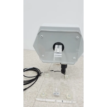 Gray octagonal chemdaq steri-trac 2 peracetic acid monitor with black port and clear acrylic stand for safe chemical tracking