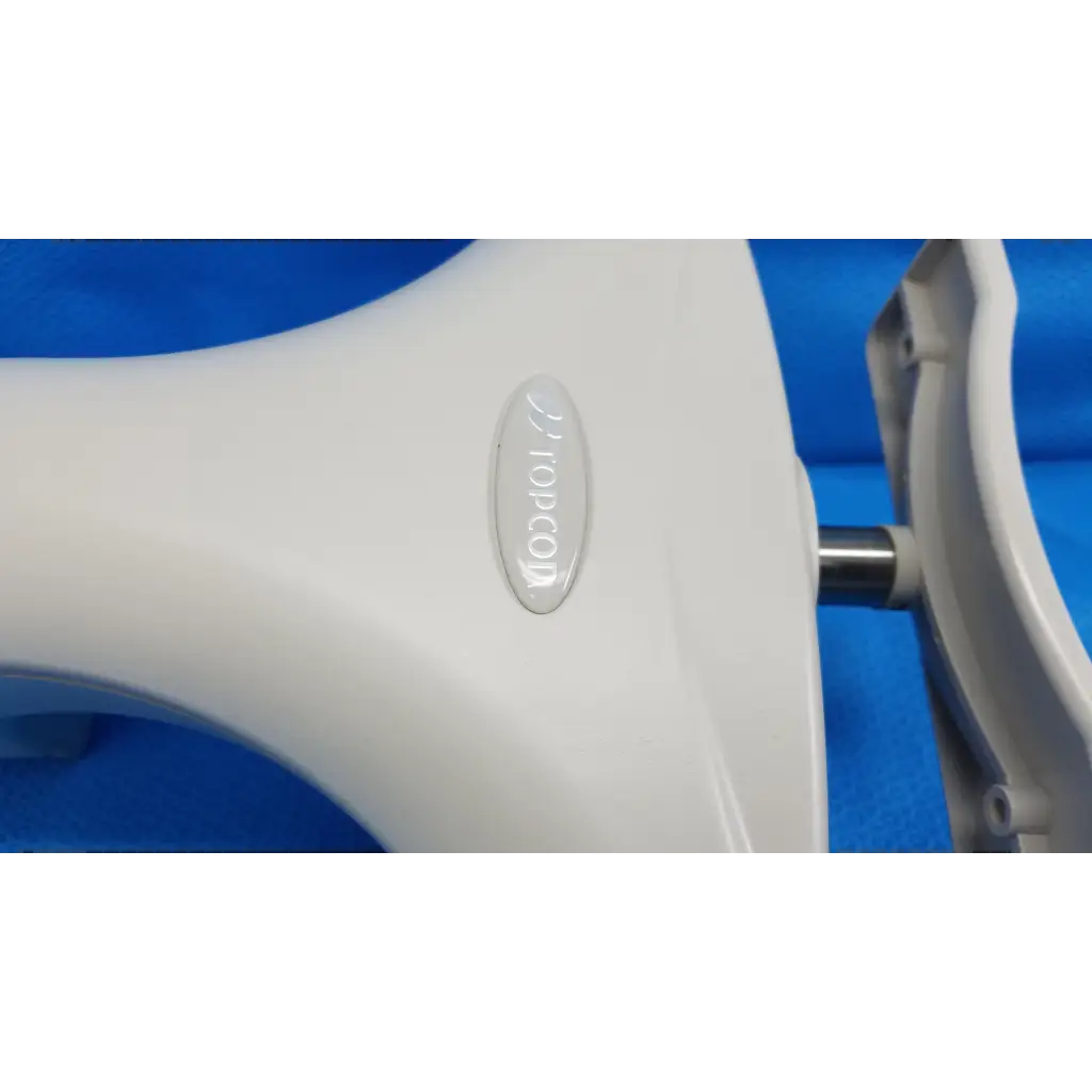 White plastic chin rest assembly frame for topcon trc-nw8 retinal camera with sleek curved design and metallic accent