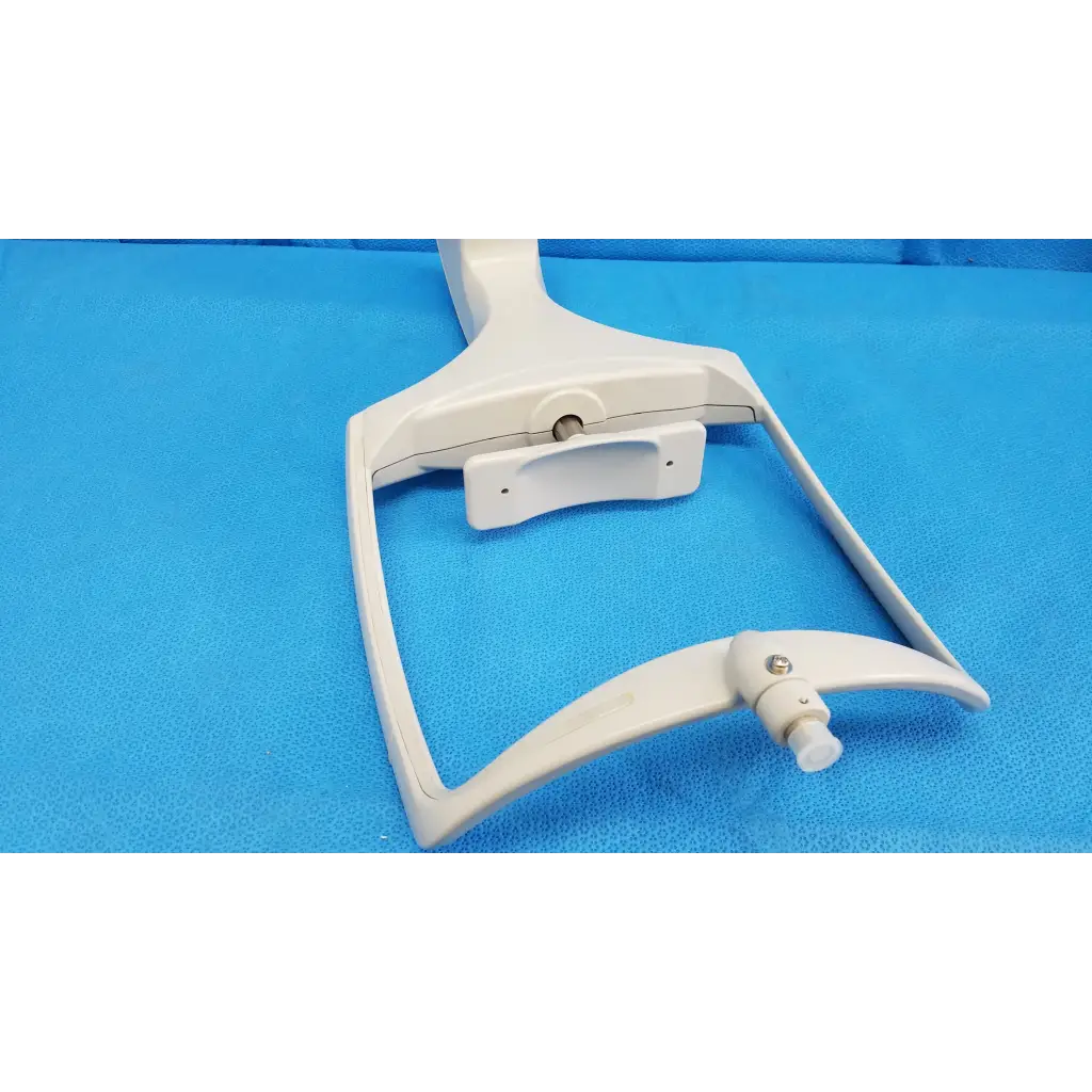 White plastic chin rest assembly frame with adjustable arms and central mounting plate for topcon trc-nw8 retinal camera