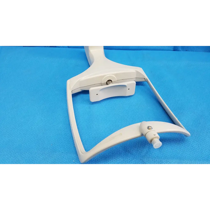 White plastic chin rest assembly frame with adjustable arms and central mounting plate for topcon trc-nw8 retinal camera