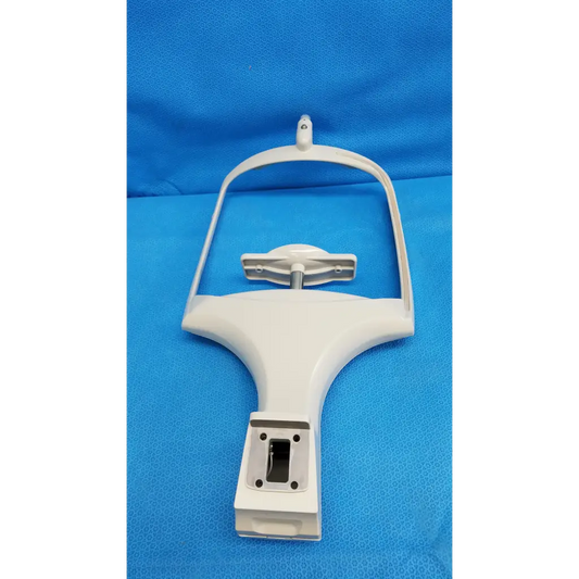 White plastic chin rest assembly headrest with central adjustment and mounting bracket for topcon trc-nw8 retinal camera
