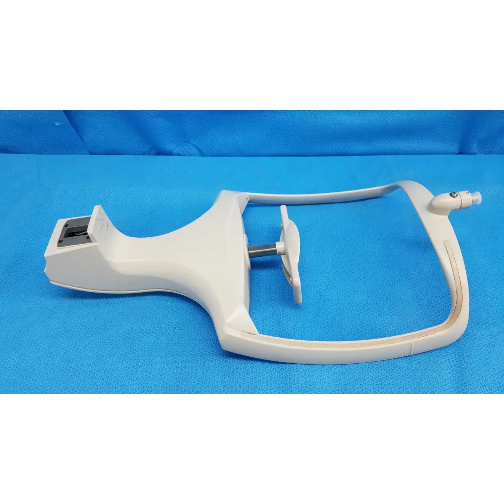 White plastic dental handpiece with curved handle and adjustable arm in chin rest assembly for topcon trc-nw8 retinal camera