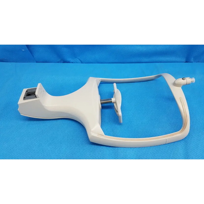 White plastic dental handpiece with curved handle and adjustable arm in chin rest assembly for topcon trc-nw8 retinal camera