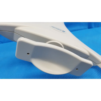 White plastic chin rest assembly frame with curved handle and two small holes for topcon trc-nw8 retinal camera