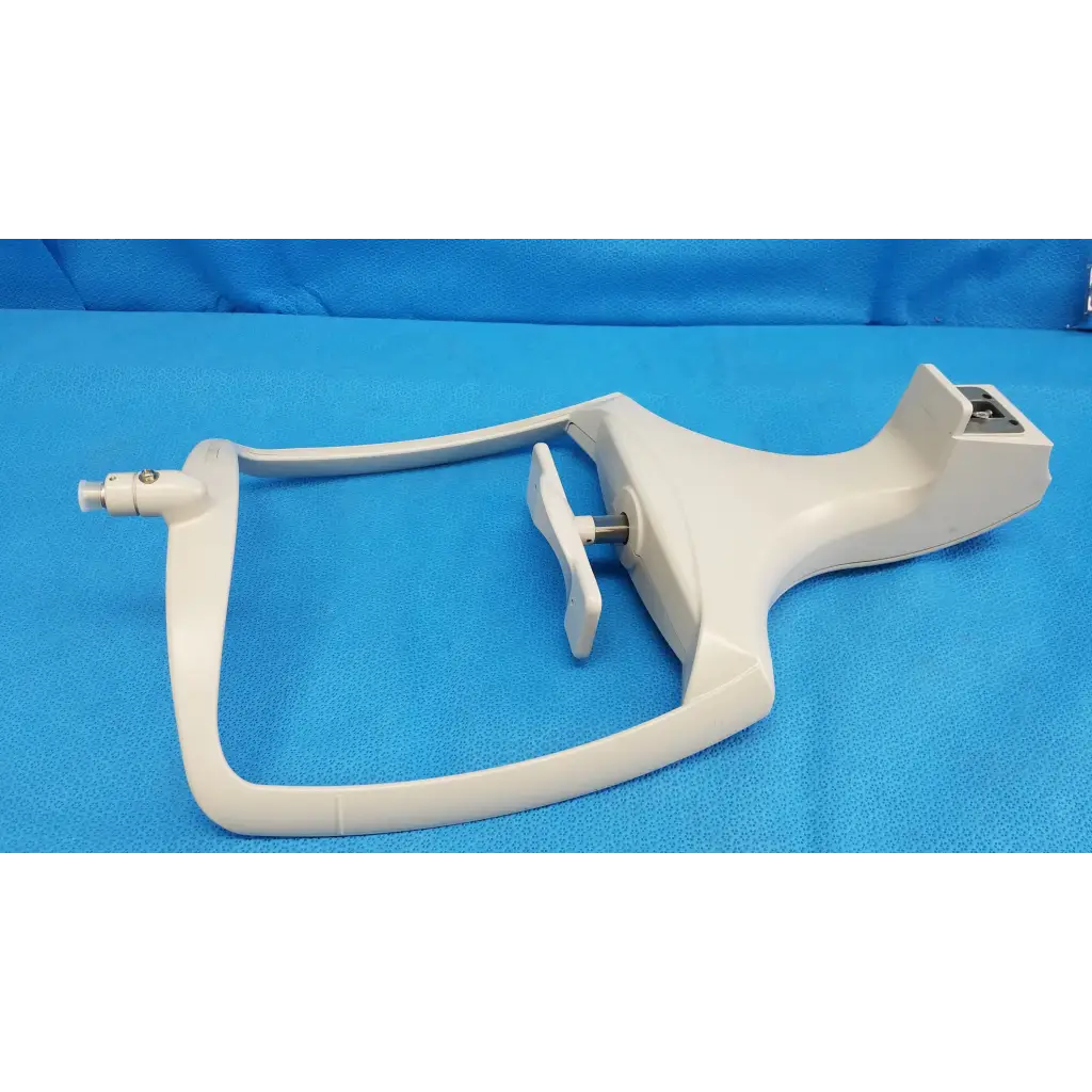 White plastic mixing attachment shown with chin rest assembly frame for topcon trc-nw8 retinal camera