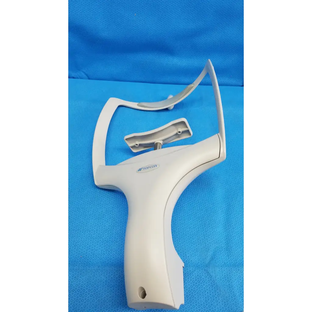 White plastic tesevon hand-held phoropter with curved arm and adjustable frame for chin rest assembly frame used in topcon trc-nw8 retinal camera