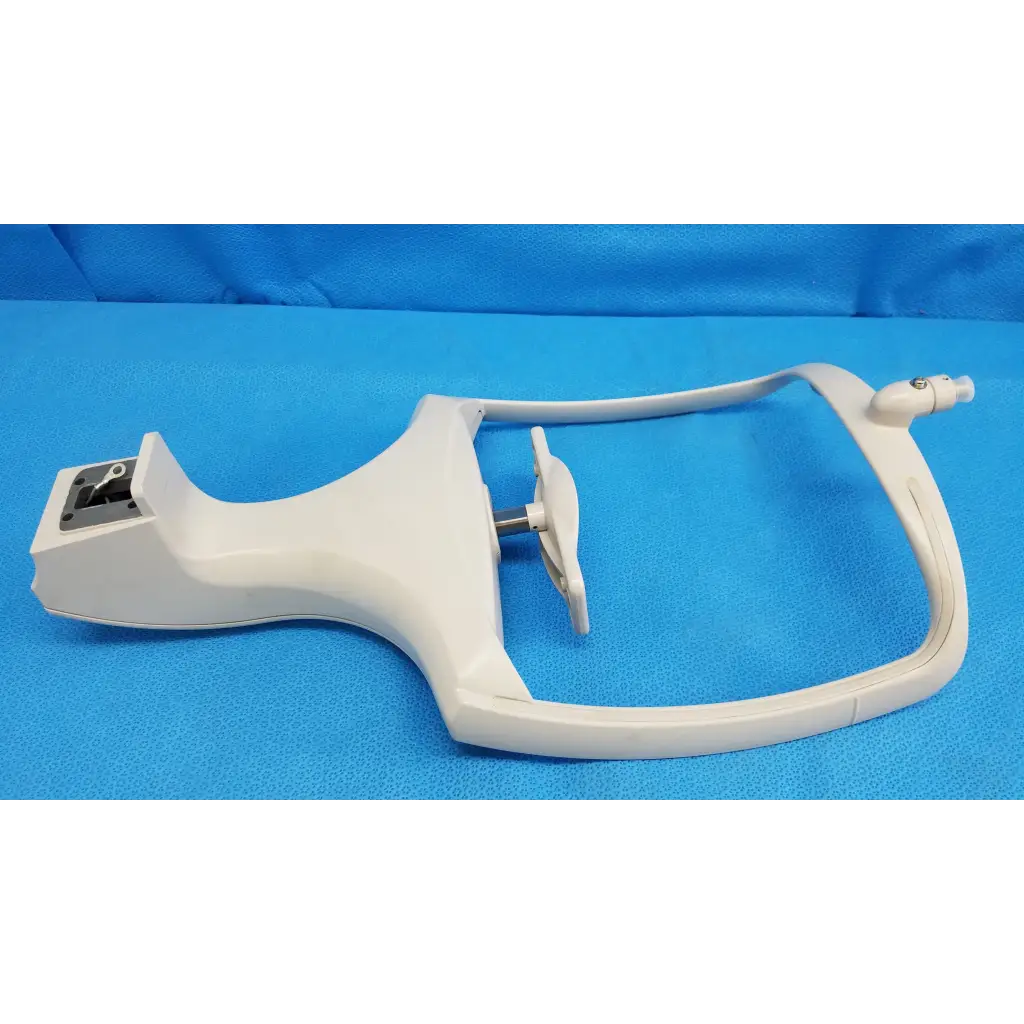 White plastic otoscope with curved handle and adjustable headpiece for chin rest assembly frame topcon trc-nw8 retinal camera