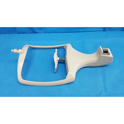 White plastic chin rest assembly mixing bowl attachment with central shaft and side handle for topcon trc-nw8 retinal camera