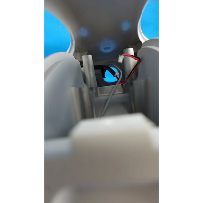 White plastic chin rest forehead assembly frame with blue lights and wiring for topcon trc-nw6s retinal camera