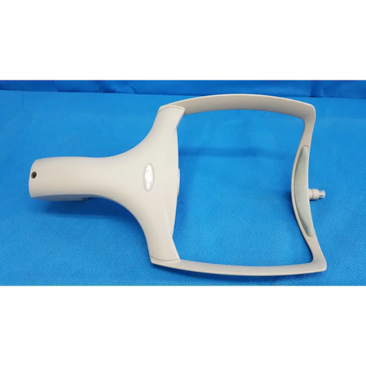 White plastic dental handpiece handle with ergonomic grip and mounting bracket for trc-nw6s chin rest forehead assembly