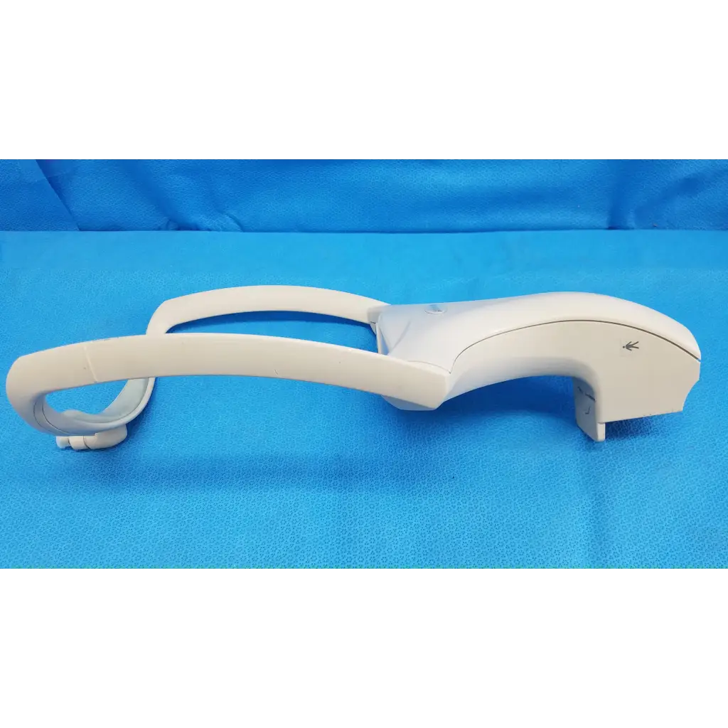 White plastic curved ergonomic handle with arrow symbol for trc-nw6s chin rest forehead rest assembly frame