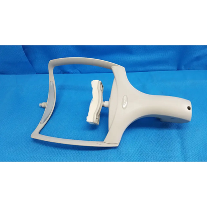 White plastic window cleaning tool with curved handle and squeegee for trc-nw6s chin rest forehead assembly frame