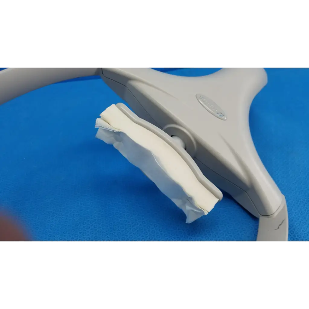 Gray plastic chin rest forehead frame with white padded strap for trc-nw6s chinrest paper assembly