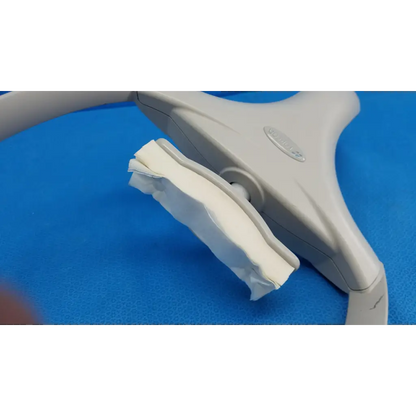 Gray plastic chin rest forehead frame with white padded strap for trc-nw6s chinrest paper assembly