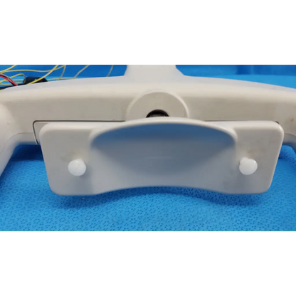 White plastic drone landing gear with rounded edges and two small white caps for trc-nw6s forehead rest assembly frame