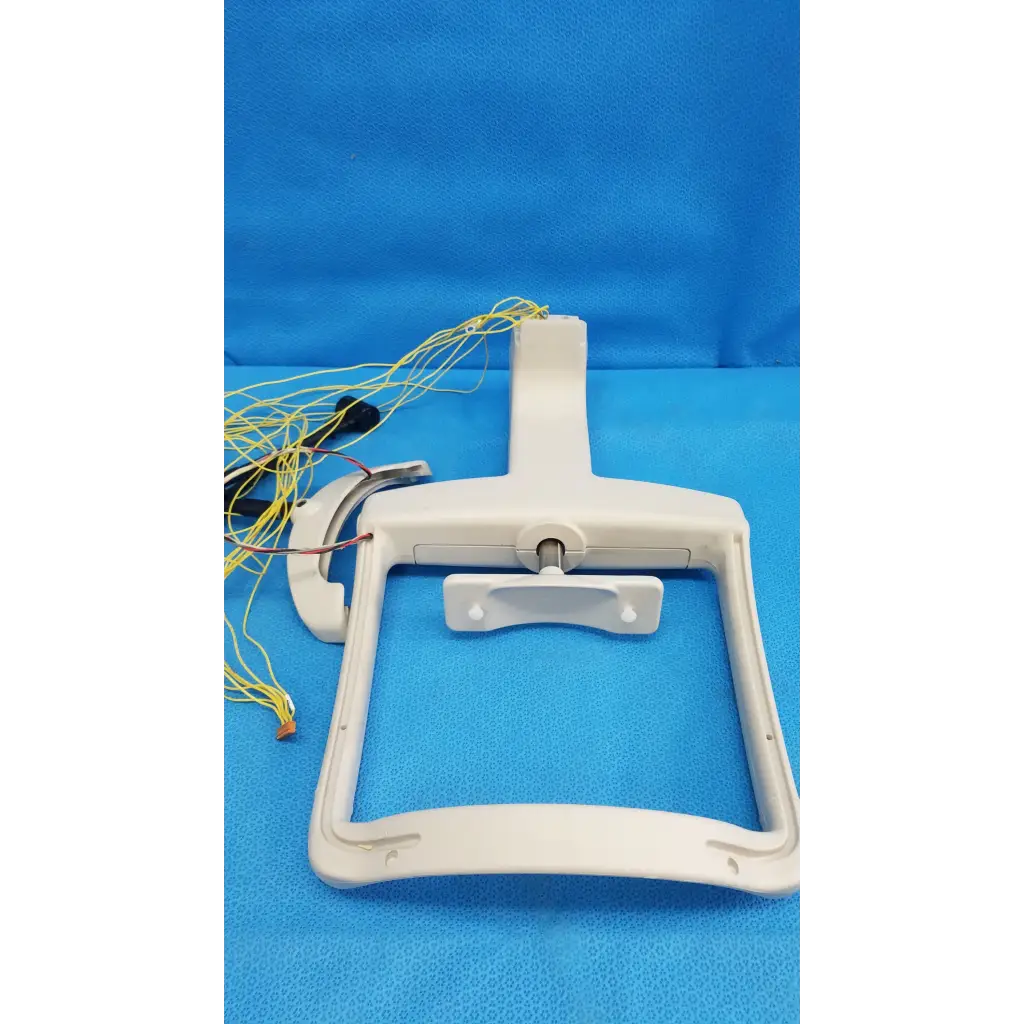 White plastic forehead rest assembly frame with handle, latch, and yellow wiring for trc-nw6s retinal camera sensor