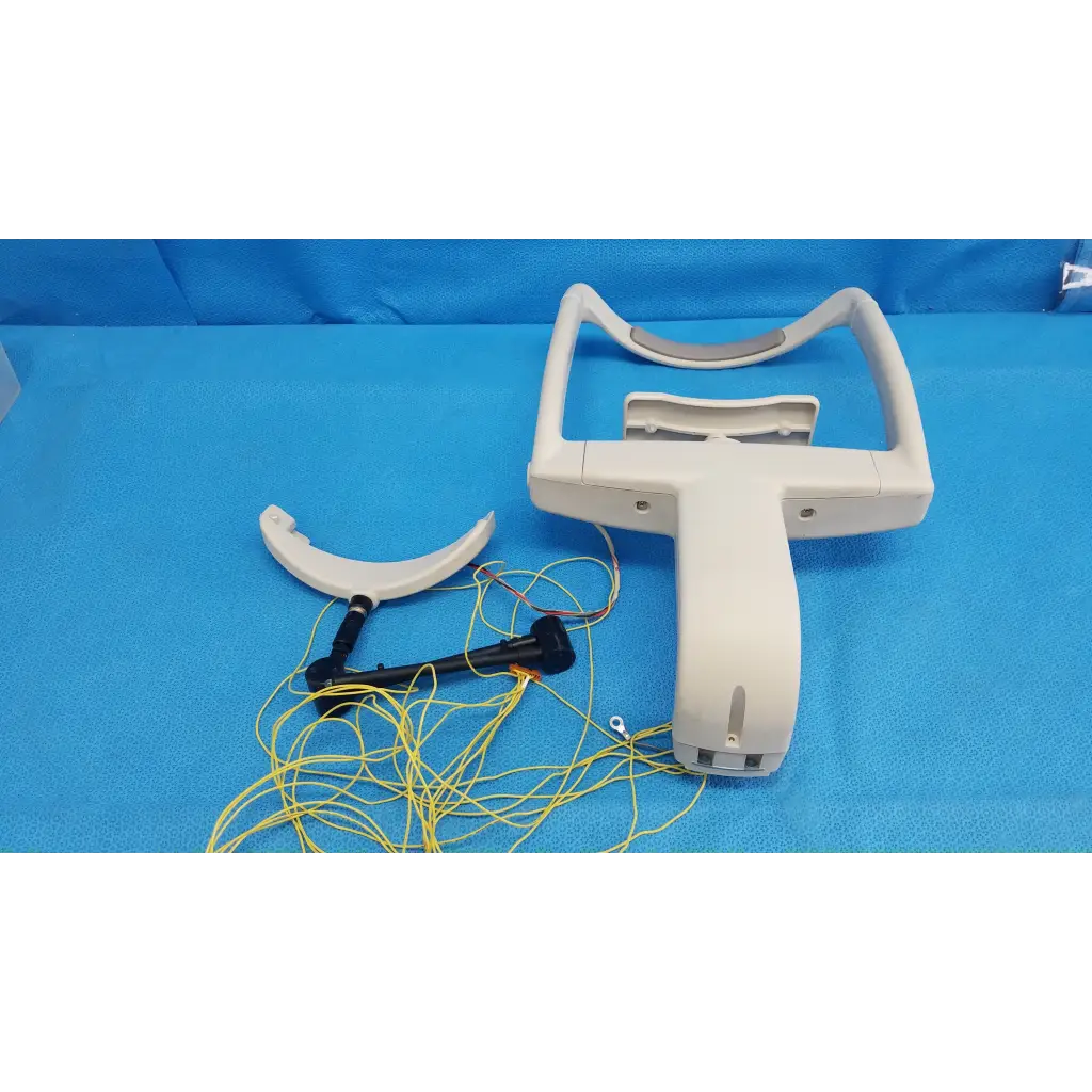 White plastic laryngoscope handle with curved blade and yellow wiring for trc-nw6s forehead rest assembly frame