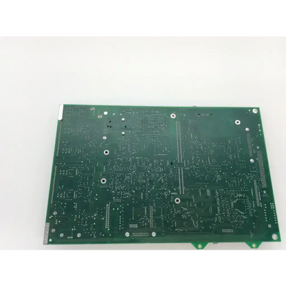Green rectangular printed circuit board with silver solder pads and mounting holes for chiron diagnostics rev g fab rev d module