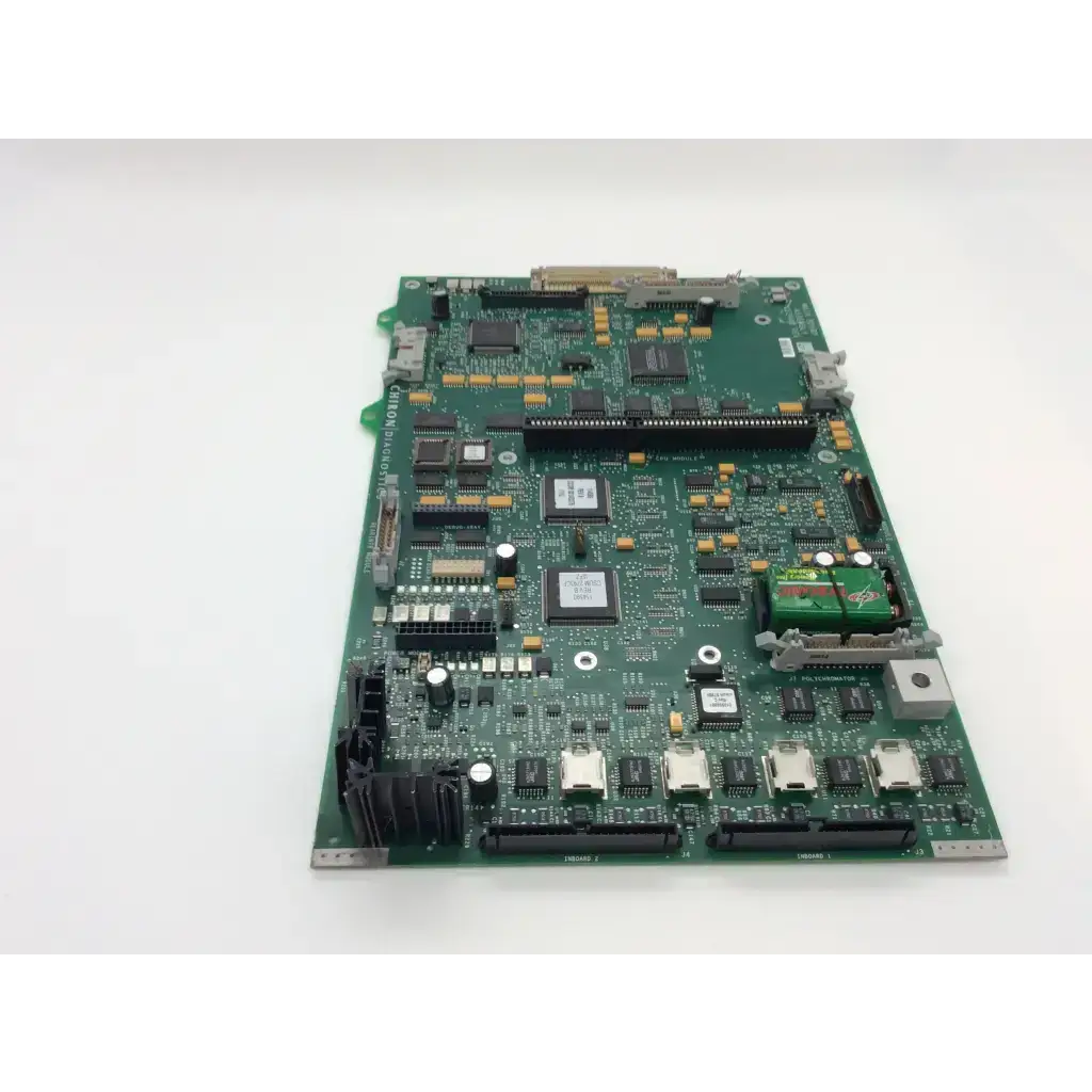 Green printed circuit board with black and silver components chiron diagnostics rev g fab and rev d module board