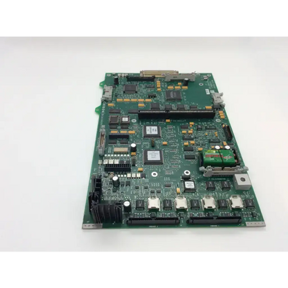 Green printed circuit board with black and silver components chiron diagnostics rev g fab and rev d module board