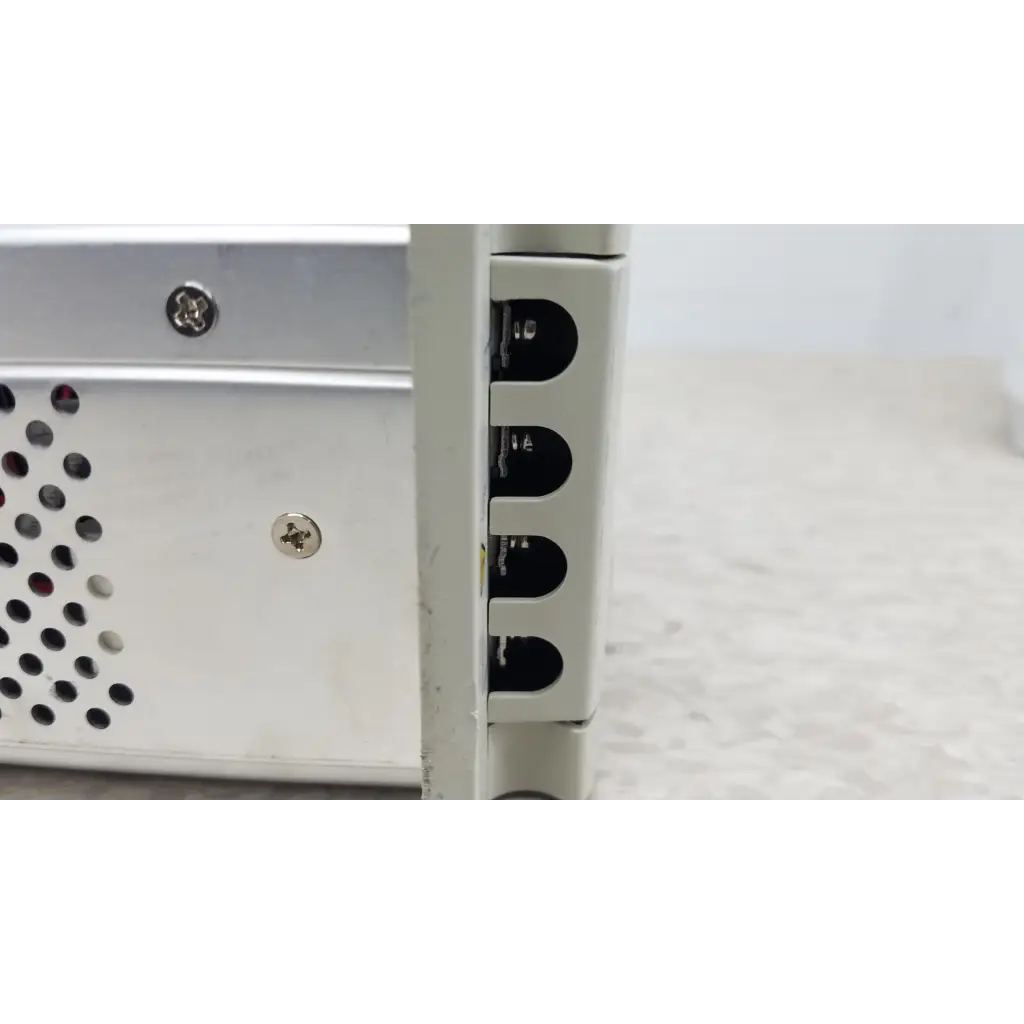 White metal chroma 63107 dc electronic load module with vertical port array and perforated side panel