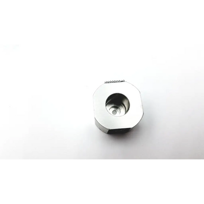 Shiny silver hexagonal metal nozzle with central threaded hole and fine serrated edge for cic product use