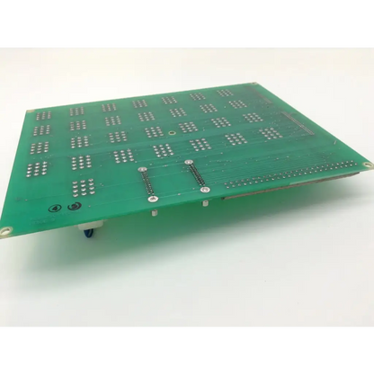 Green rectangular cincinnati siemens acramatic cnc control input board with silver soldered components and mounting holes