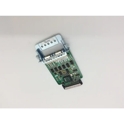 Cisco 73-8970-05 A1 hwic-4t wan interface card with green circuit board silver connectors in light gray metal casing