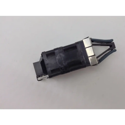 Black plastic car door lock actuator with silver metal contacts and wiring shown as catalyst fan module c3kx-fan-23cfm part